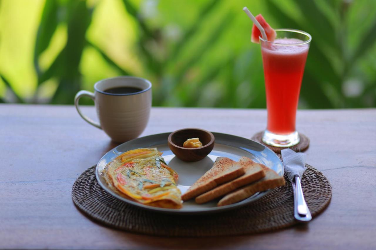 Nirwa Ubud Homestay Buitenkant foto